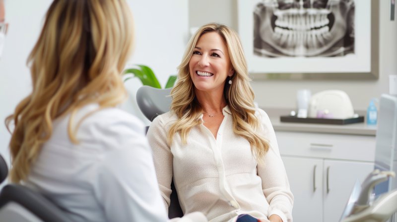 woman meeting cosmetic dentist